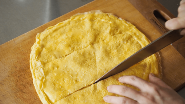 slicing the crepe into strips