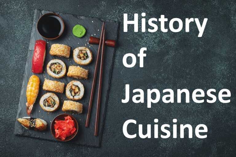 History of Japanese cuisine: sushi and chopsticks on a dark board