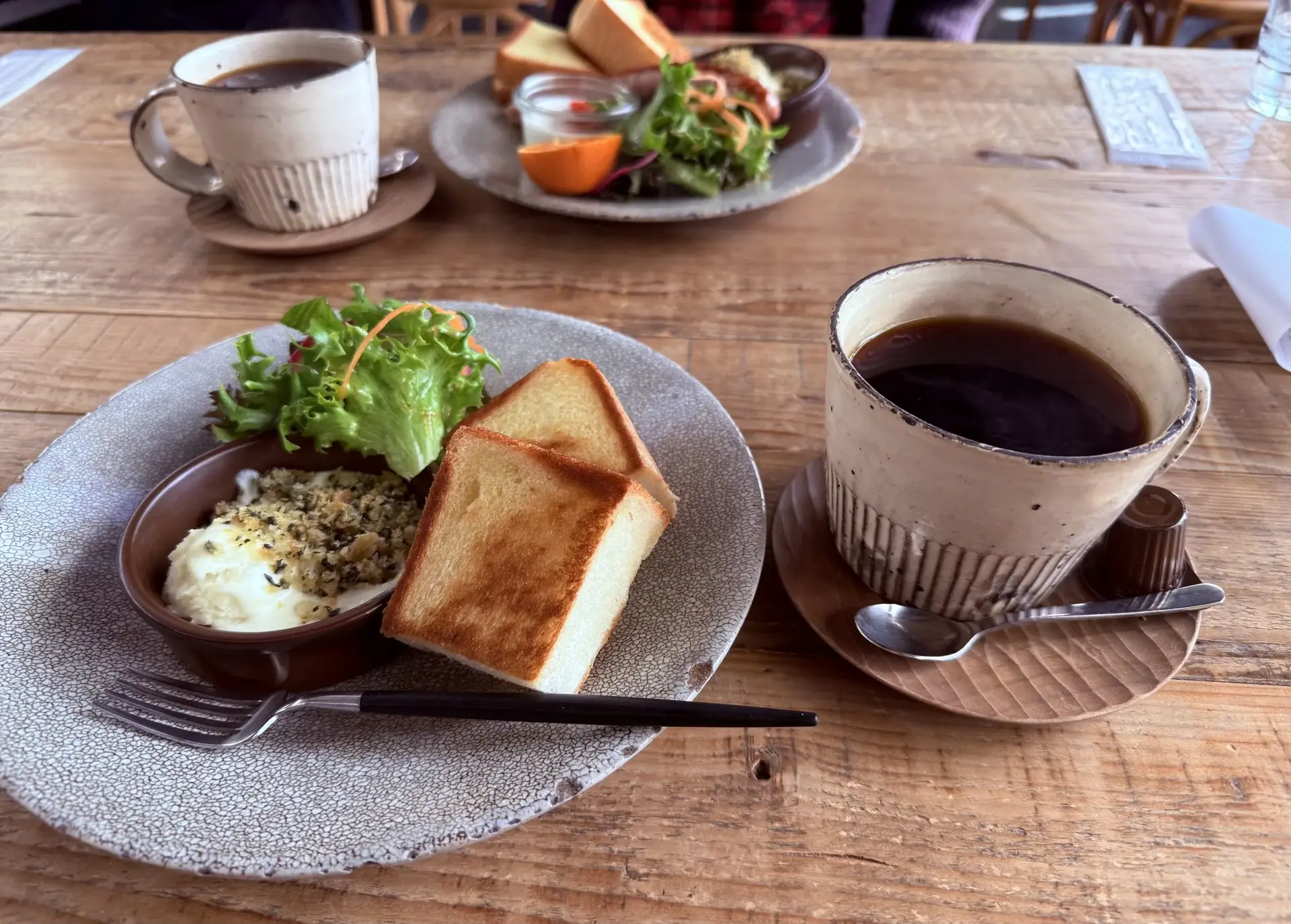 Morning set of toast, egg and coffee on a cafe counter, Gifu