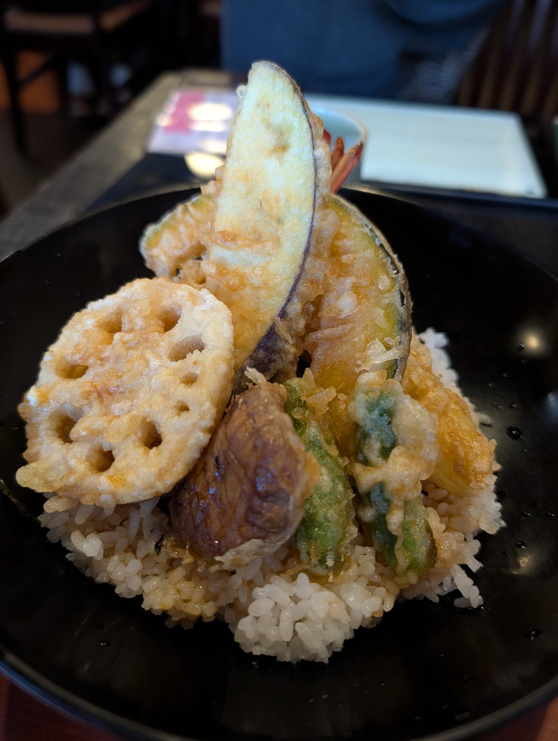 Tempura over rice: lotus root, eggplant, pumpkin, shiitake and green peppers